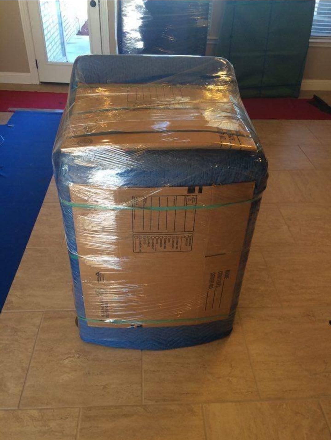 How to move a washing machine Professional movers moving a washer